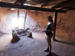 Janice in a kiva at Pecos NHP