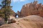 Charlie checking out an arch above the Fairyland Canyon trail.