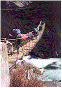 Yaks crossing a bridge over the Dudh Koshi river