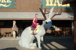 Janice riding a rabbit at Wall Drug