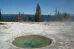 A perfectly-round hot spring at West Thumb geyser basin. 